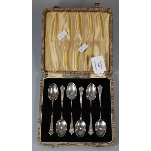 227 - Set of six silver cased tea spoons, Birmingham hallmarks.  2.38 troy oz. approx.   (B.P. 21% + VAT)