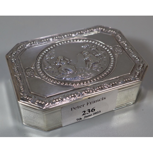 236 - White metal, probably German, octagonal box, the top decorated with relief figures of young children... 