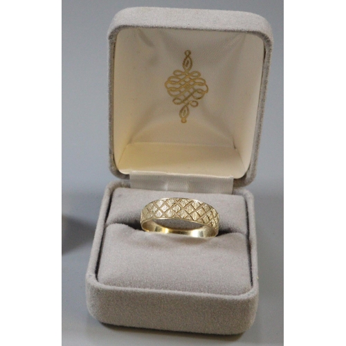 244 - 14ct gold textured ring.  2.7g approx.  Size W.   (B.P. 21% + VAT)