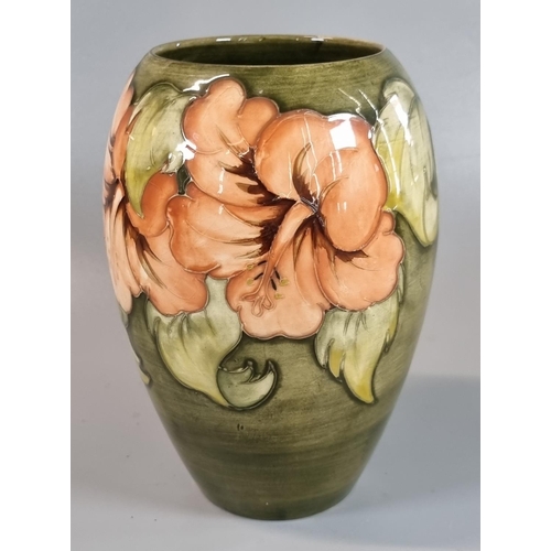 3 - Moorcroft pottery tube lined Hibiscus vase of  ovoid form, impressed and signed marks to the undersi... 