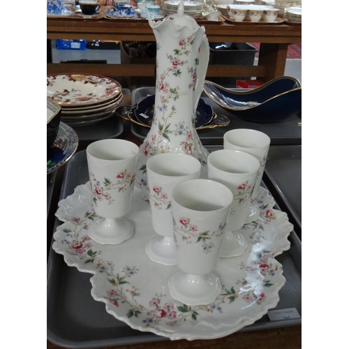 361 - Limoges France floral seven piece set (possibly for hot chocolate) comprising; five goblets, tray an... 