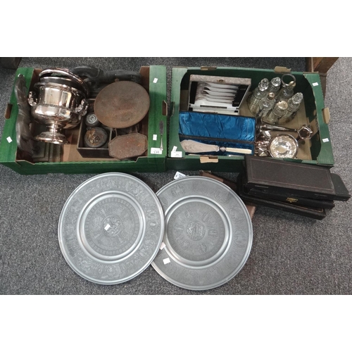 379 - Two boxes of metalware to include: Berendson pewter chargers, a moulded glass and silver plate cruet... 