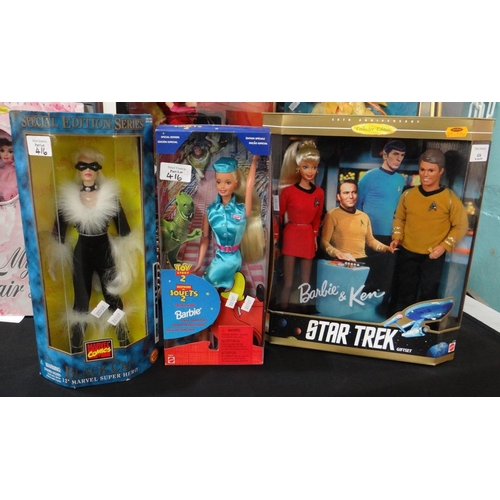 416 - Three Barbie dolls, to include: Toy Story 2, Marvel Comics Black Cat and Barbie and Ken Star Trek gi... 