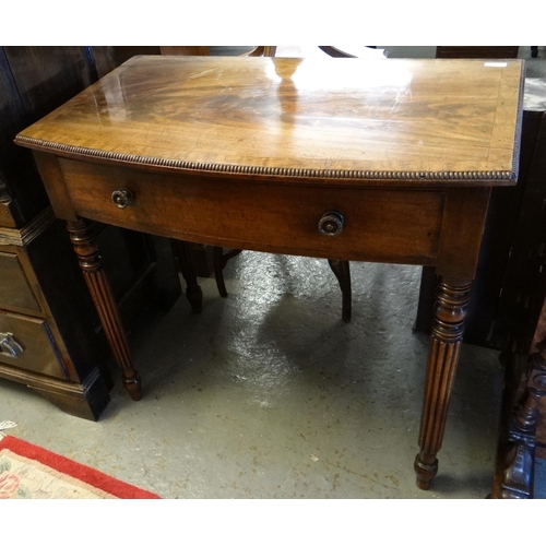 486 - Victorian mahogany bow front single drawer side table on fluted tapering legs.  90x52x84cm approx.  ... 