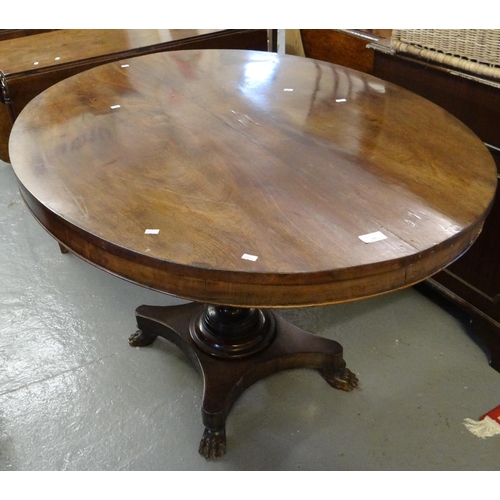 543 - 19th century mahogany oval centre table on quatrefoil base and paw feet.  (B.P. 21% + VAT)