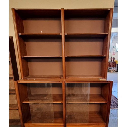 551 - Mid century Danish hardwood two stage open bookcase, the base revealing two removeable shelves with ... 