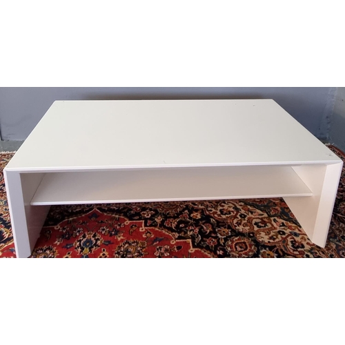 552 - Modern designer white finished coffee table of rectangular form with undershelf.  122cm wide approx.... 