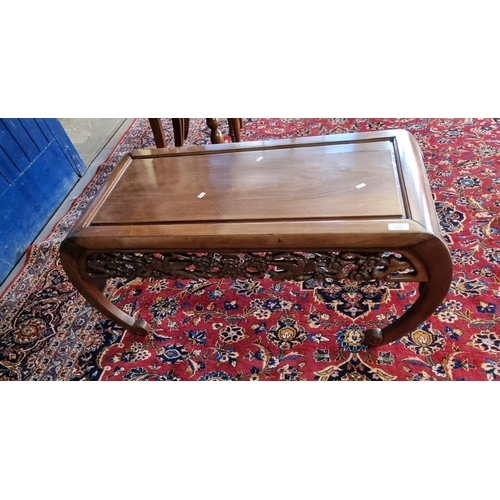 553 - 20th century Chinese hardwood coffee/low table with carved frieze of prunus and foliage.   (B.P. 21%... 