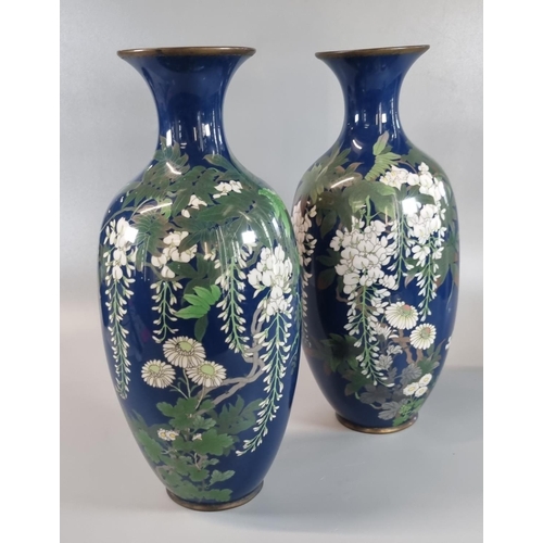 56 - Pair of early 20th century Japanese dark blue ground baluster shaped vases overall decorated with fl... 