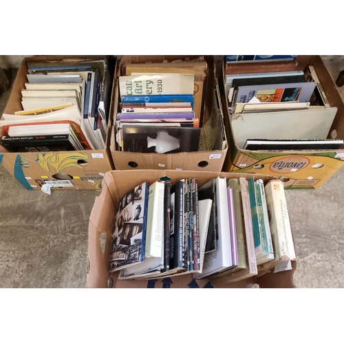 561 - Four boxes of assorted books to include: Architectural Digest, Artist's Textiles 1945-1970, American... 