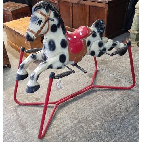 580 - Mid century Mobo style tin child's rocking horse on tubular frame.   (B.P. 21% + VAT)