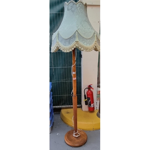 581 - Modern pale oak standard lamp with an assortment of shades.  (B.P. 21% + VAT)