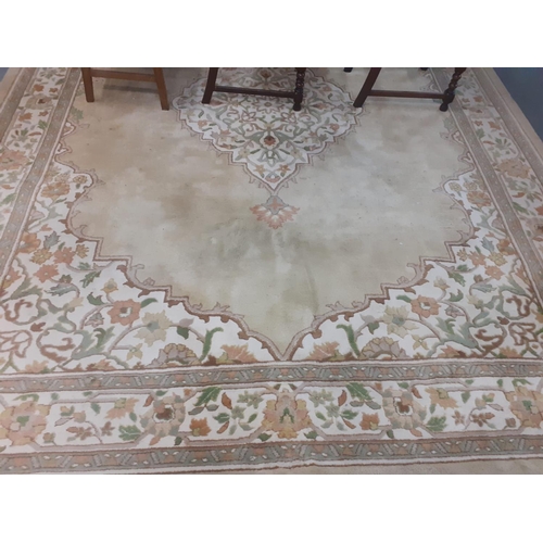 586 - Large cream ground Middle Eastern design floral and foliate carpet.  367x280cm approx.  (B.P. 21% + ... 