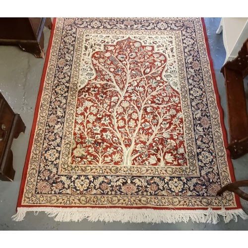 588 - Vintage Persian Tree of Life red ground floral and foliate rug.(B.P. 21% + VAT)