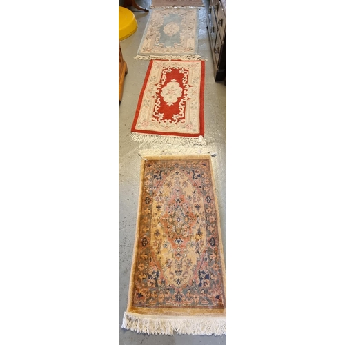 589 - Two modern Chinese wash ground rugs together with two small Middle Eastern design runners.  (4)  (B.... 