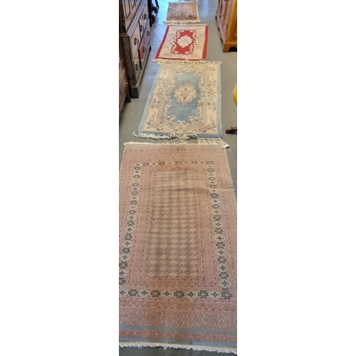 589 - Two modern Chinese wash ground rugs together with two small Middle Eastern design runners.  (4)  (B.... 