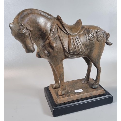 61 - Cast patinated metal Tang style horse on rectangular plinth.  25cm high approx overall.   (B.P. 21% ... 