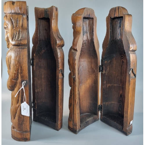 70 - Pair of carved pine term type figures, opening to reveal bottle space.  Modern.  41cm high approx.  ... 