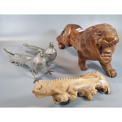 71 - Carved wooden figure of a roaring African lion.  35cm long approx.,  an Indonesian carved root wood ... 