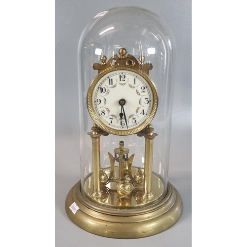 89 - Brass 100 day perpetual motion mantle clock with Arabic face and glass dome on brass base.   (B.P. 2... 