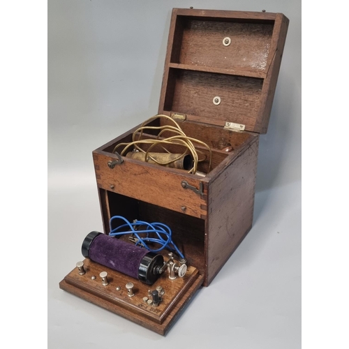 94 - Late 19th early 20th century electric shock machine in fitted mahogany carrying case.   (B.P. 21% + ... 