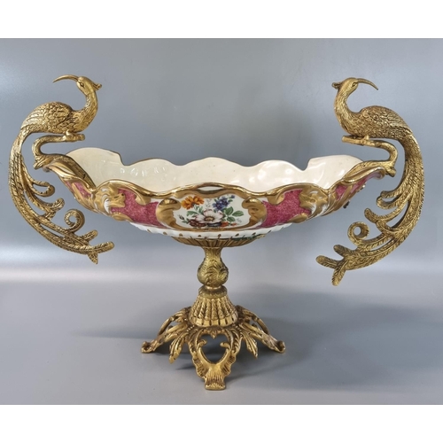 104 - Modern continental porcelain floral and foliate oval centre bowl decorated with gilt metal exotic bi... 