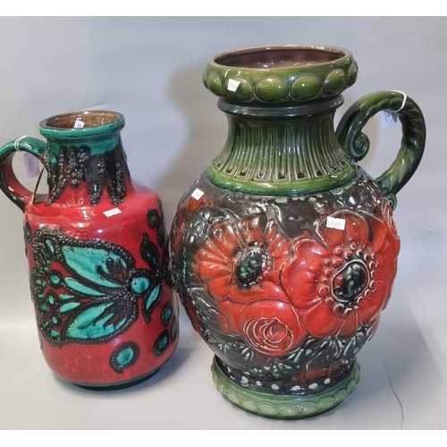 110 - West German pottery fat lava red ground and green abstract single handled jug together with another ... 