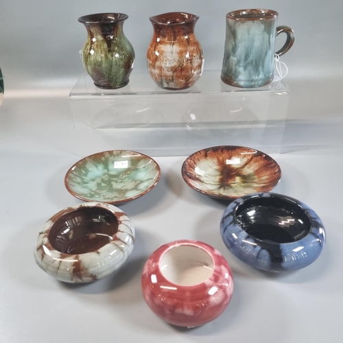 125 - Collection of Ewenny pottery items to include: pin dishes, ashtray, straight sided mug etc.  (8)  (B... 