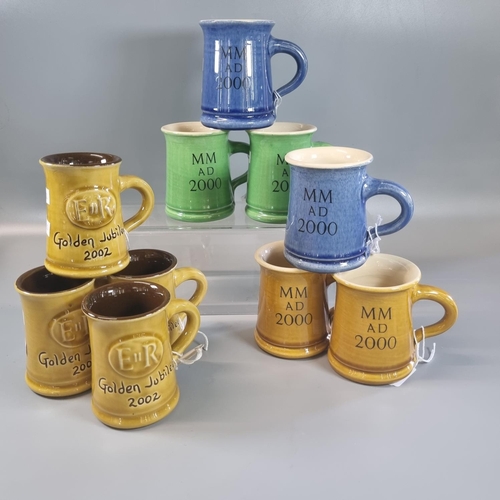 130 - Collection of modern Ewenny pottery commemorative and other mugs marked: ER Golden Jubilee 2002 and ... 