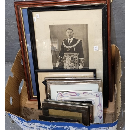 179 - A box of assorted picture frames and furnishing pictures including: Masonic portrait, football print... 