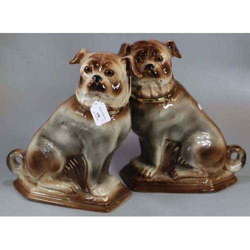 198 - Pair of early 20th century Staffordshire Pottery seated Pug fireside dogs with glass eyes.  (2)  (B.... 