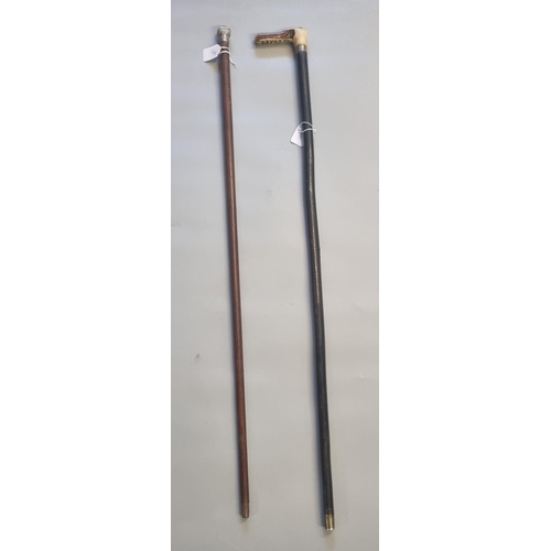 216 - Two walking canes, one with white metal knop the other with horn grip.  (2)  (B.P. 21% + VAT)