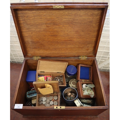 218 - Early 20th century wooden oak box, the interior revealing assorted coinage: GB and Foreign, some sil... 