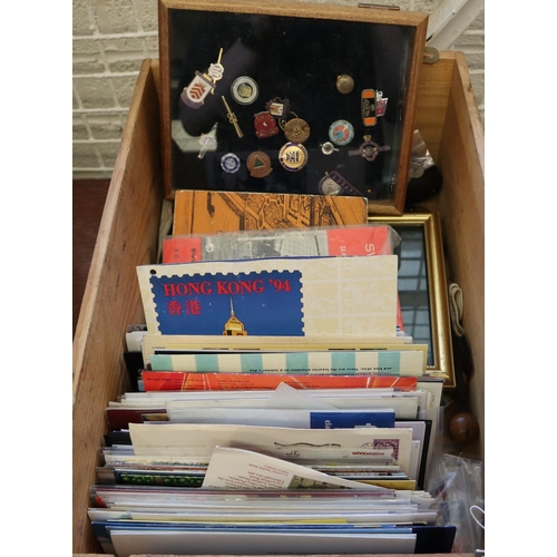 219 - Pine box with assorted items, to include: empty stamp presentation packs, small glass case with asso... 