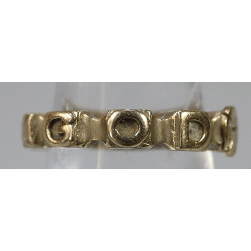 279 - 9ct gold ring marked 'Love God'.  Size K.  4.3g approx.  (B.P. 21% + VAT)