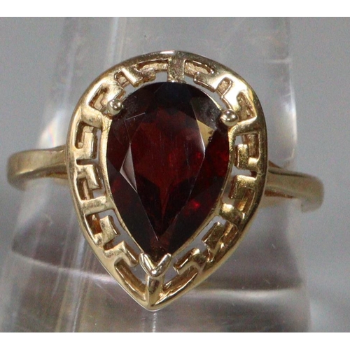 287 - 14ct gold coloured red pear shaped stone dress ring.  Size S.  3.9g approx.  (B.P. 21% + VAT)