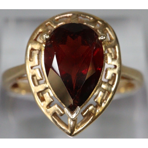 287 - 14ct gold coloured red pear shaped stone dress ring.  Size S.  3.9g approx.  (B.P. 21% + VAT)