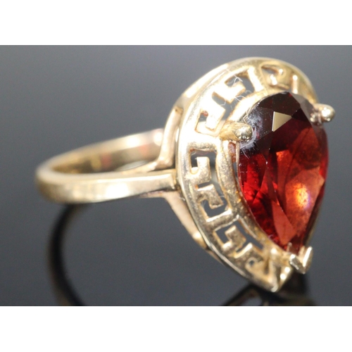 287 - 14ct gold coloured red pear shaped stone dress ring.  Size S.  3.9g approx.  (B.P. 21% + VAT)