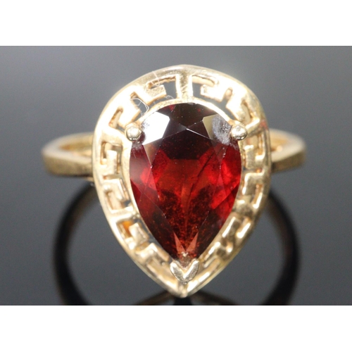 287 - 14ct gold coloured red pear shaped stone dress ring.  Size S.  3.9g approx.  (B.P. 21% + VAT)