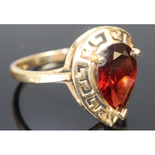 287 - 14ct gold coloured red pear shaped stone dress ring.  Size S.  3.9g approx.  (B.P. 21% + VAT)