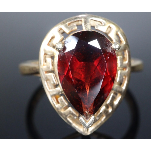 287 - 14ct gold coloured red pear shaped stone dress ring.  Size S.  3.9g approx.  (B.P. 21% + VAT)