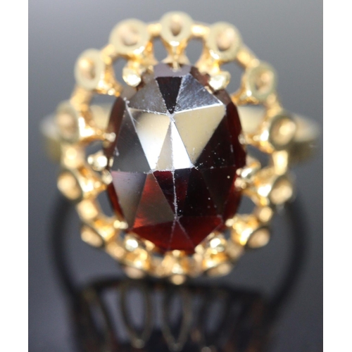 288 - 14ct gold red stone dress ring.  Size O.  3.5g approx.  (B.P. 21% + VAT)