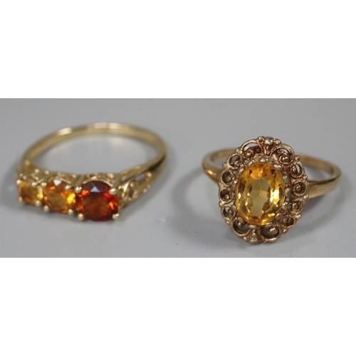 290 - Two 9ct gold coloured dress rings.  Size N and S.   5.2g approx.  (2)  (B.P. 21% + VAT)