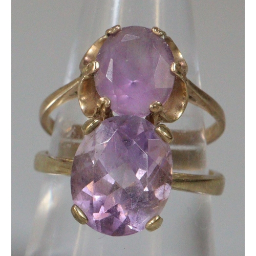 293 - Two 9ct gold purple/lilac stone dress rings.  5.4g approx.  (2)  (B.P. 21% + VAT)