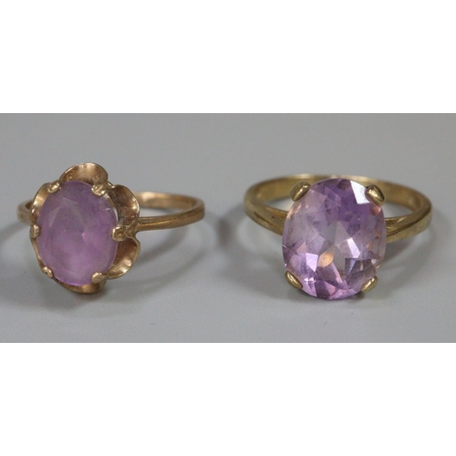 293 - Two 9ct gold purple/lilac stone dress rings.  5.4g approx.  (2)  (B.P. 21% + VAT)