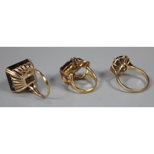 294 - 9ct gold dress ring together with another yellow metal dress ring and  another dress ring the shank ... 