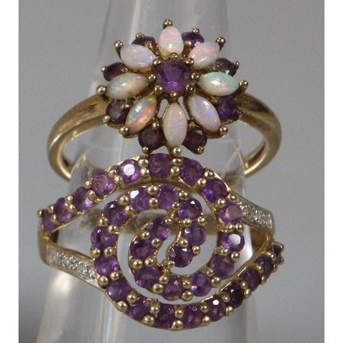 296 - 9ct gold purple and white stone dress ring, together with a 9ct gold flower head ring.  Size M1/2 an... 