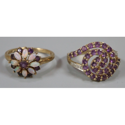 296 - 9ct gold purple and white stone dress ring, together with a 9ct gold flower head ring.  Size M1/2 an... 