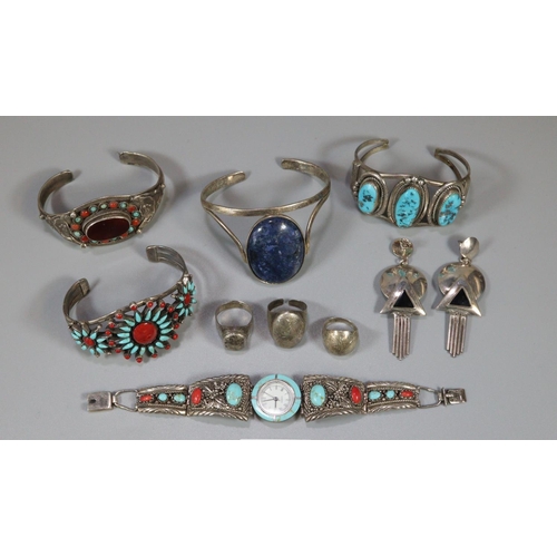 306 - Bag of assorted silver to include: bangles with turquoise and coloured stones, dress rings, Art Deco... 