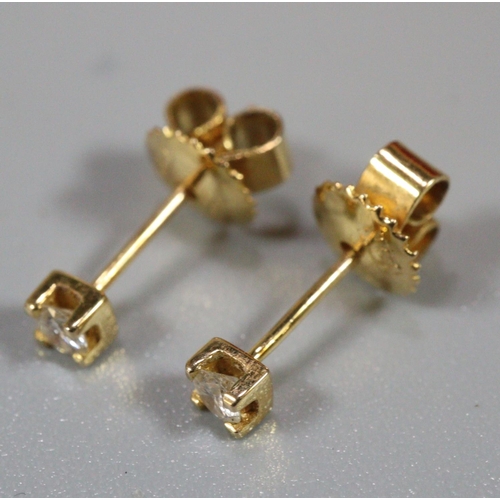 308 - Pair of gold and diamond earrings.  (B.P. 21% + VAT)